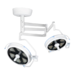 Ceiling-mounted surgical lighting system with two adjustable LED operate lights on articulated arms.